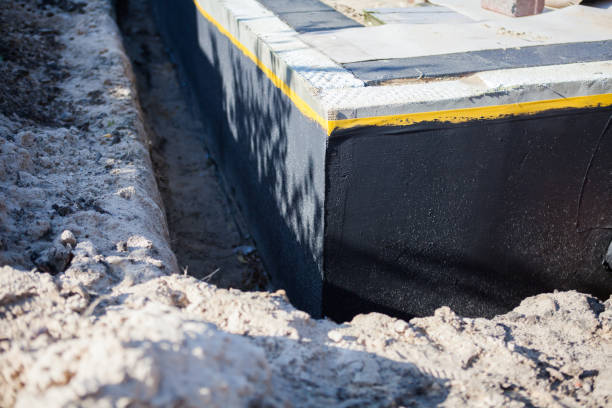 Professional Vapor Barrier Installation technician working in Lobelville, TN
